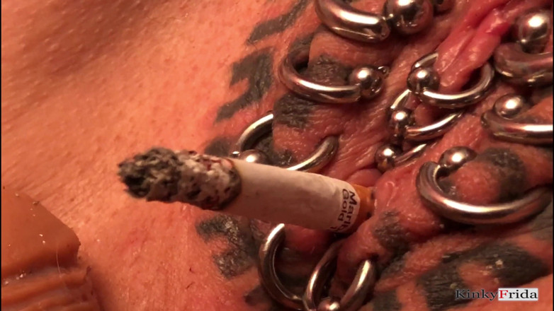 Dominatrix Frida: KinkyFrida in jeans is playing with her pierced and tattooed...
