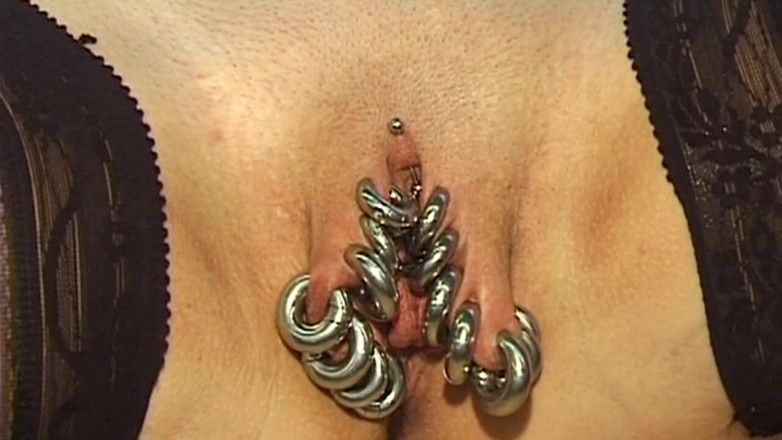 Bangora MILFs: Redhead MILF Shows off Her Extreme Piercings