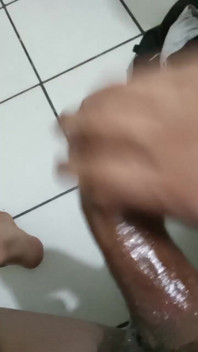 Oiled up Stroking Dick