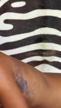 Two ebony ladies providing nuru massage