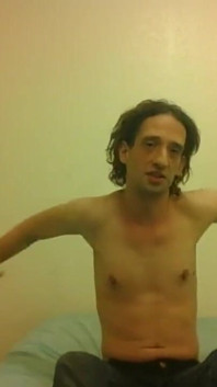 Topless Transgirl Trying to Rotate Arms 360