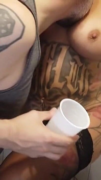Tattooed Blonde Pees Into the Cup at the Toilet and Gets a Body Shot