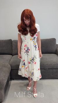 A Redhead in a Dress