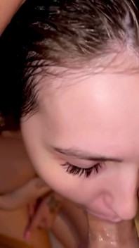 Stepmom Tries to Take It All in Her Mouth While Sitting in the Shower