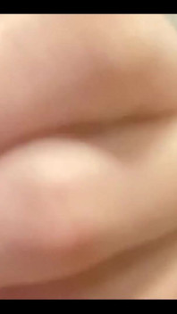 Masturbating