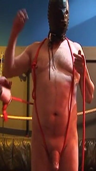 Mature Mistress Binds Masked Sub for Hot Wax Play
