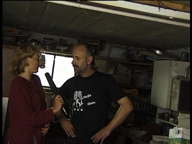 Lucky Cooch: Blonde interviewing a blacksmith