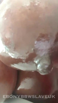 Huge Saggy Black Boobs Covered in Baby Oil