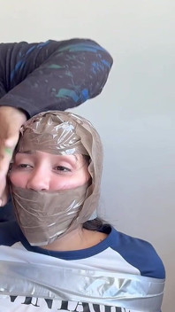 Fantasizing 18-year-old Taped & Gagged by Masked MILF