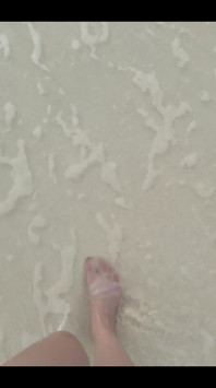 Running my bare feet on the white beach sand by the ocean.