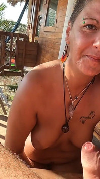 A Nice Blowjob on the Terrace Overlooking the Beach
