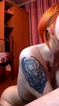 Passionate blowjob of a gorgeous redhead beauty
