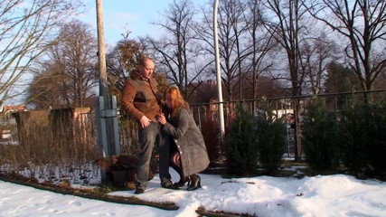 Public Entertainment: Mature woman having fun outside