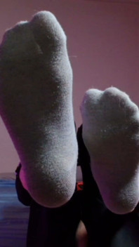 Puppy Keeps Teasing You with His Socks and Bare Paws