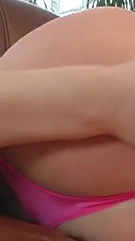Horny and hot young brunette masturbates her wet pussy