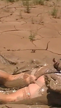 Julie Cunningham in Lingerie Wriggles Hard in Mud Hogtied with Chains. Sploshing Dirty Whore. Huge Tits Covered in Mud.