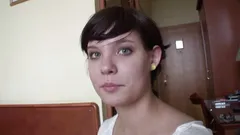 Brunette teen plays with glass dildo