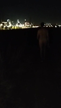 Naked Walking on the Hill Along Highway