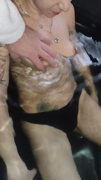 Relaxing in the Jacuzzi, They're Massaging My Breasts