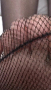 Goddess of High Heels Shows off Her Black Patent Leather Mules