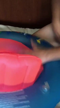 Playing with inflatable swim ring