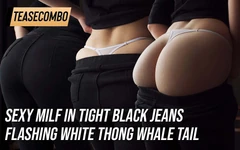 Sexy MILF v těsných černých džínách ukazující bílé tanga velryby ocas