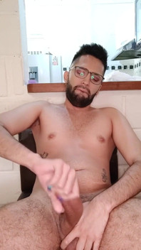 Jerking my big uncut cock with lube until I cum