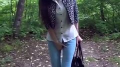 Skinny Brunette Desperate to Pee in the Woods Has to Find a Way to Empty Her Bladder