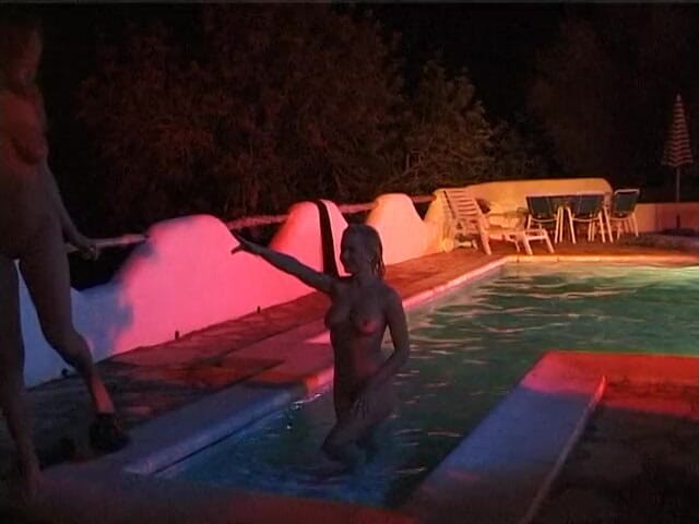 Naughty Girls: Two sexy lesbian chicks are swimming together in the swimming...