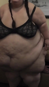 BigmommaKat facesits Pat on the sofa