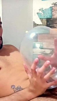 Fucking an inflated condom until I cum inside of it