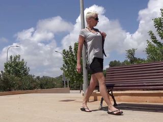 Watersports Media: Short hair blonde babe enjoys pissing outdoors