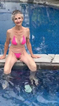 By the Hotel Pool in My Skimpy Pink Bikini