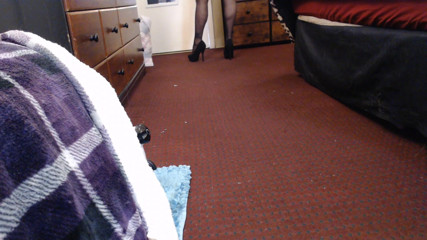 Abby Anna: Putting on black pantyhose tease