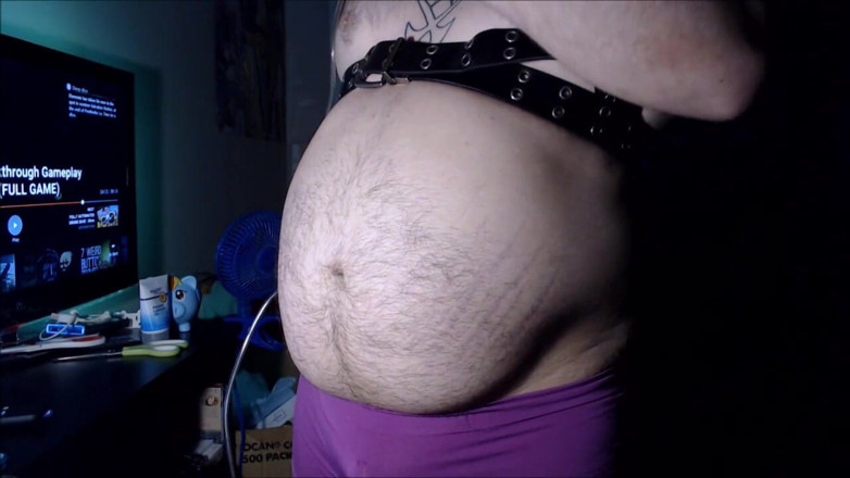 Akevantelico91: Belly inflation in purple boyshorts