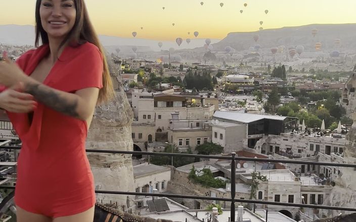 Monika Fox: Wunderschöne Monika Fox im roten Anzug in den Bergen von...