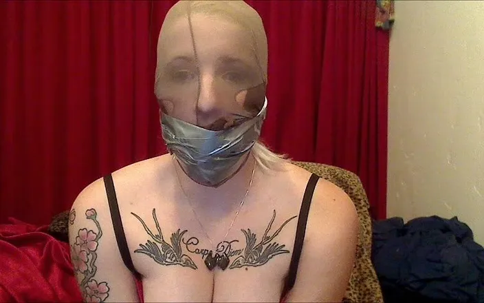 Selfgags classic: Professional dominatrix self-gagged and pantyhose hooded