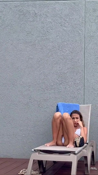 I Filmed My Famous Neighbor Sunbathing with Dental Floss on