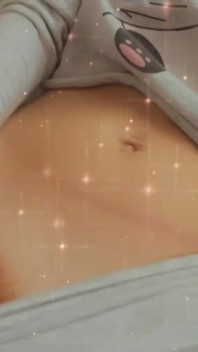 Gently masturbates her red pussy with her finger and gets an orgasm. Caressing excited tits