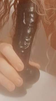 Sucking MILF Dildo