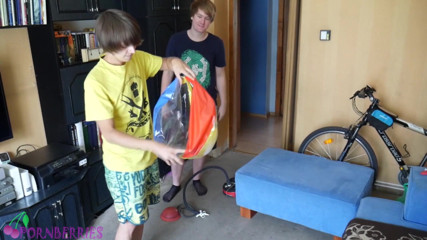 Ethan Alex: Thin, black socks blowing up balloons + footjob