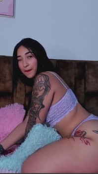 Tattooed Woman with a Delicious Ass