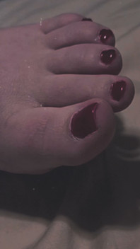 Sexy Red Toes in Bed