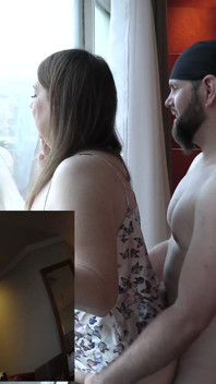 Neuken in het raam van een hotel