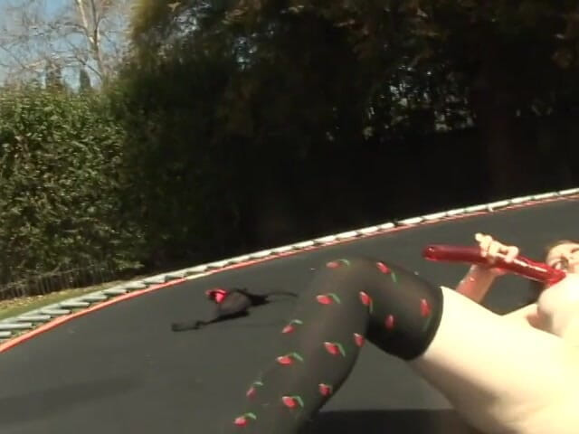 Solo Sensations: Milky skin redhead shoves dildo in her ass outdoors