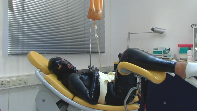 Rubber & Clinic Studio - 1ATOYS: Клизма в латексном комбинезоне