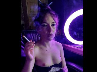 Asian wife homemade videos: A beautiful lady smokes a cigarette