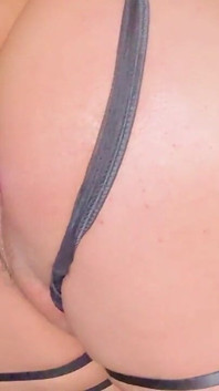 A Gay Man Dressed as a Woman Moves in a Seductive Manner.