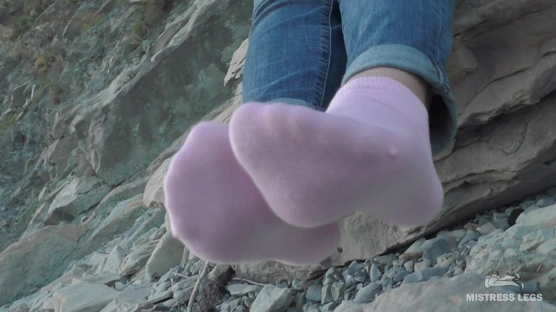 Mistress Legs: Sexy feet in pink ankle socks on the seashore