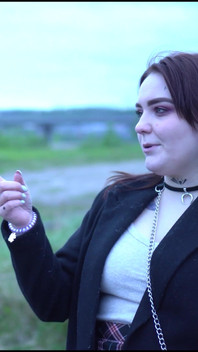 A Beauty with a Tattoo Shows Her Tits